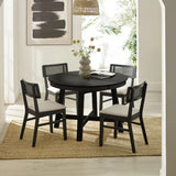Julian Bowen Annika satin black extending round dining table in a contemporary dining room setting