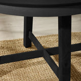 Julian Bowen Annika satin black extending round dining table in a contemporary dining room setting