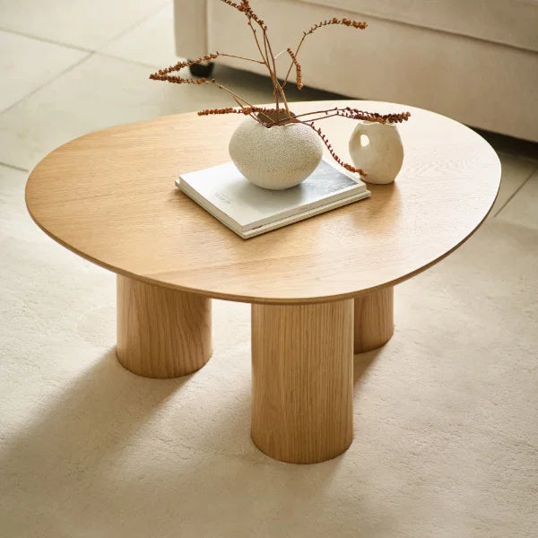 Anya oak effect asymmetrical coffee table in a modern Scandinavian living room setting
