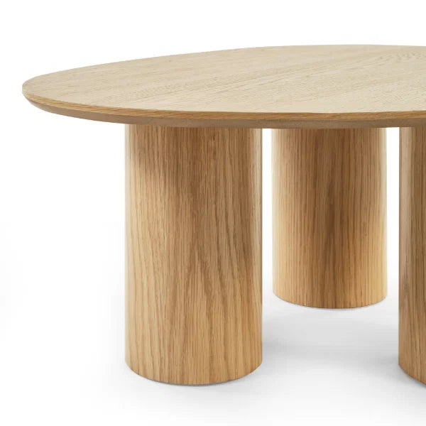 Anya oak effect asymmetrical coffee table in a modern Scandinavian living room setting