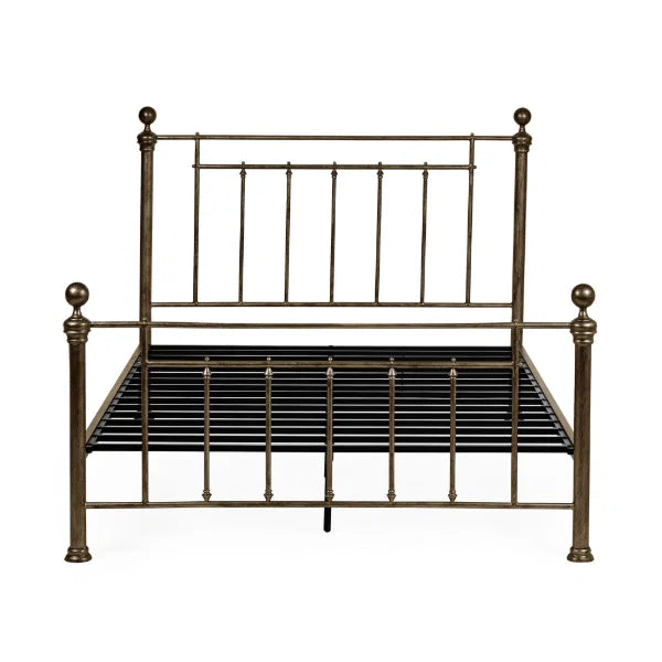 Aurelia brass effect metal bed in a modern bedroom setting