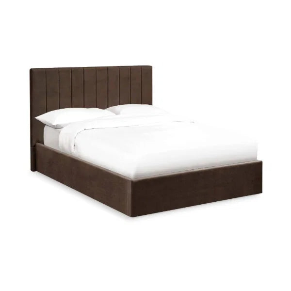 Aylen chocolate velvet ottoman storage bed with panelled headboard in a modern bedroom setting
