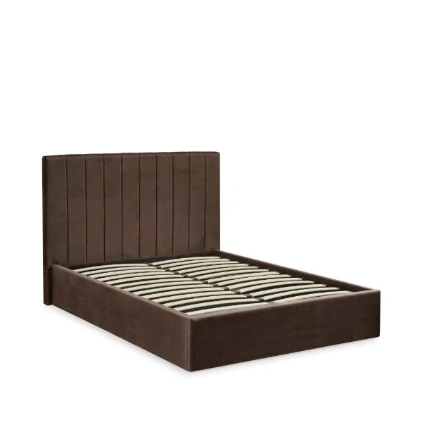 Aylen chocolate velvet ottoman storage bed with panelled headboard in a modern bedroom setting