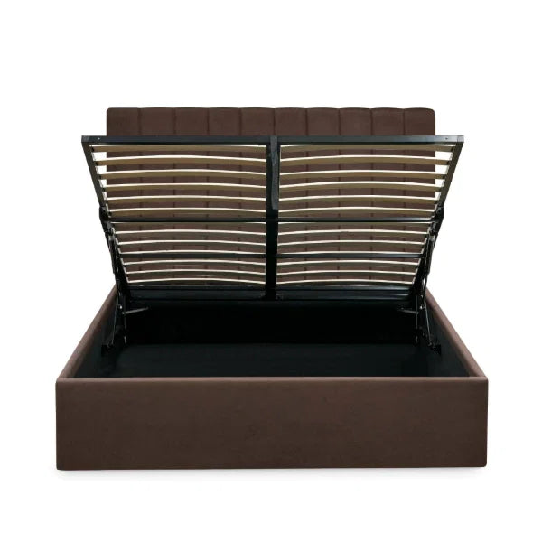 Aylen chocolate velvet ottoman storage bed with panelled headboard in a modern bedroom setting