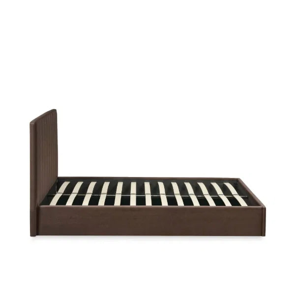 Aylen chocolate velvet ottoman storage bed with panelled headboard in a modern bedroom setting