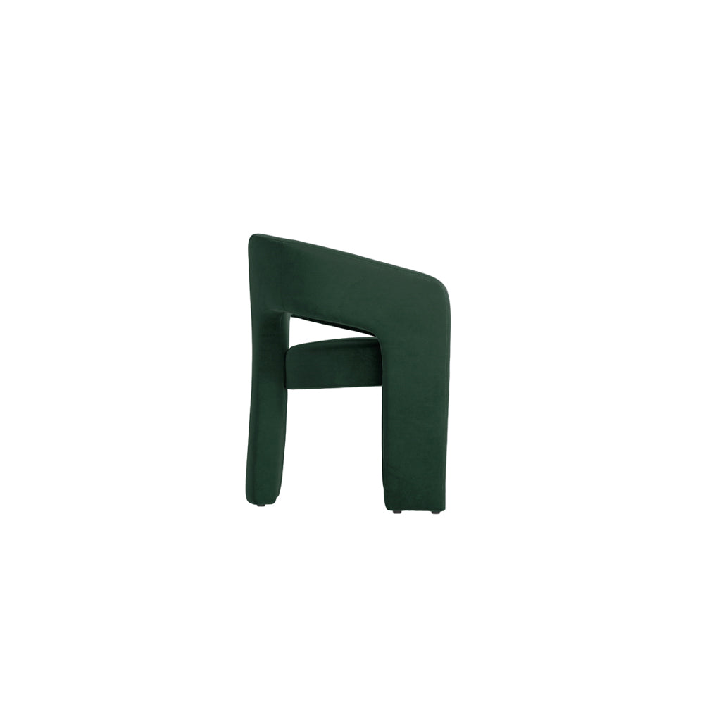 LPD Furniture Alba forest green velvet dining chair with curved design in a modern dining setting