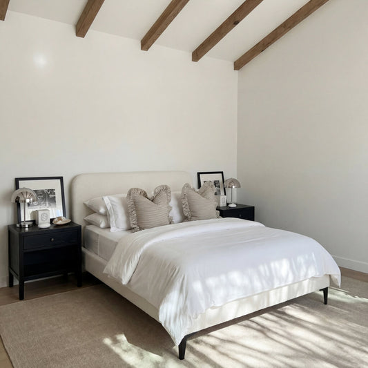 LPD Furniture Albany ivory bouclé double bed with curved headboard in a modern bedroom setting