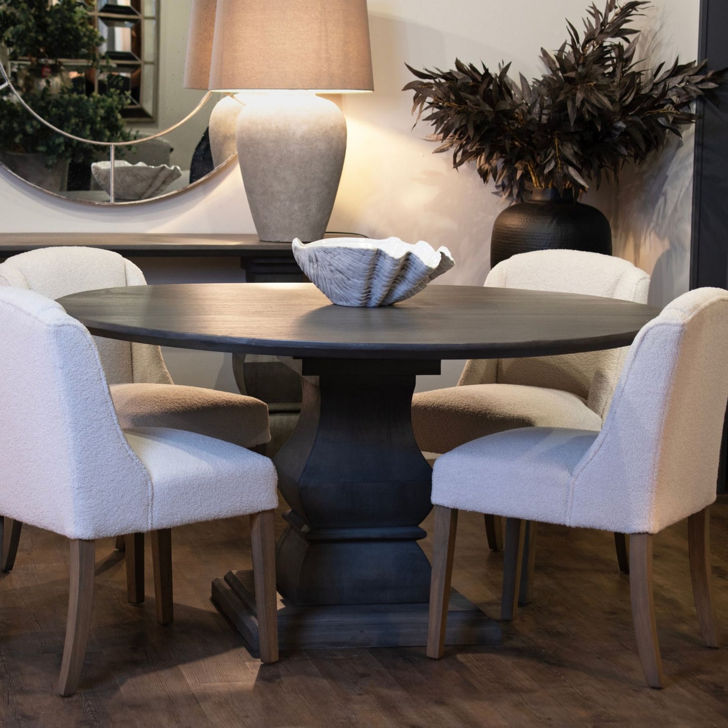	Angle view of Hill Interiors Compton boucle dining chair highlighting the premium boucle fabric texture