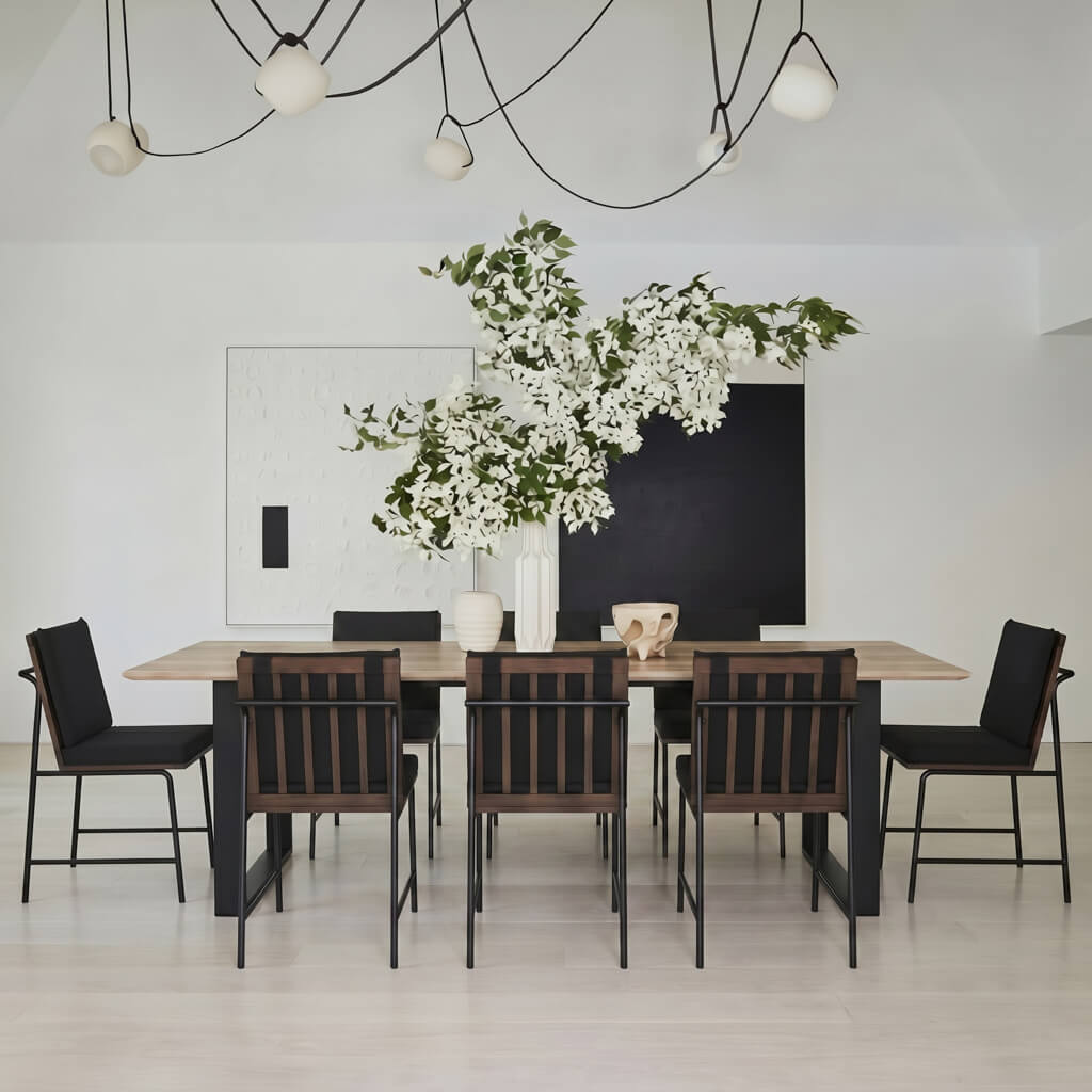 	LPD Furniture Antibes russet wood effect dining table with black U-shaped legs in a modern dining room setting