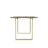 LPD Furniture Antibes russet wood effect dining table with gold U-shaped legs in a modern dining room setting