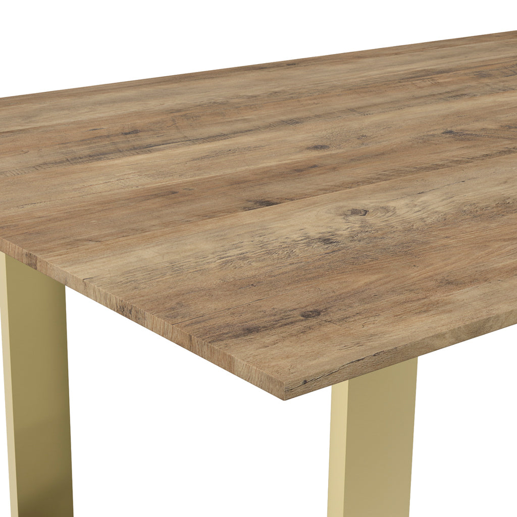 LPD Furniture Antibes russet wood effect dining table with gold U-shaped legs in a modern dining room setting