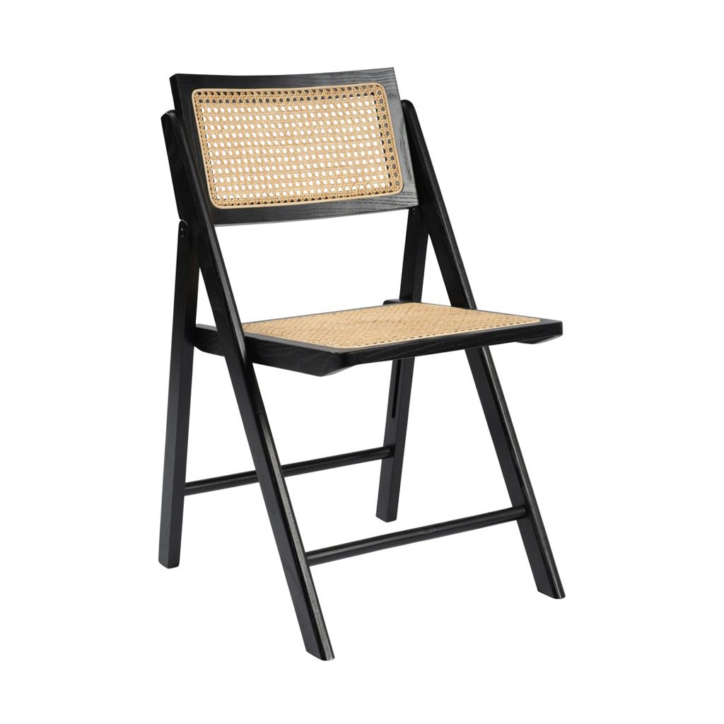 LPD Furniture Ashton black matte dining chair with rattan detailing and ash wood frame in a modern dining setting