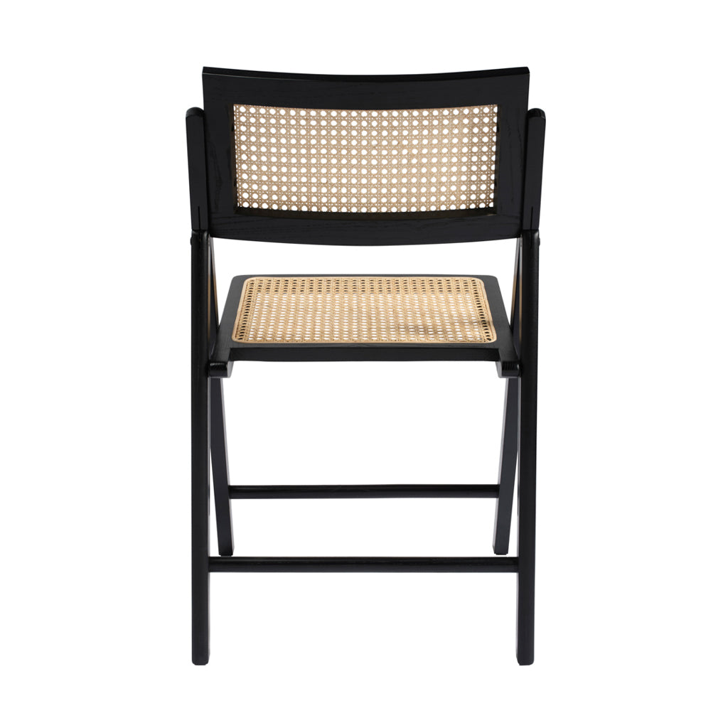 LPD Furniture Ashton black matte dining chair with rattan detailing and ash wood frame in a modern dining setting