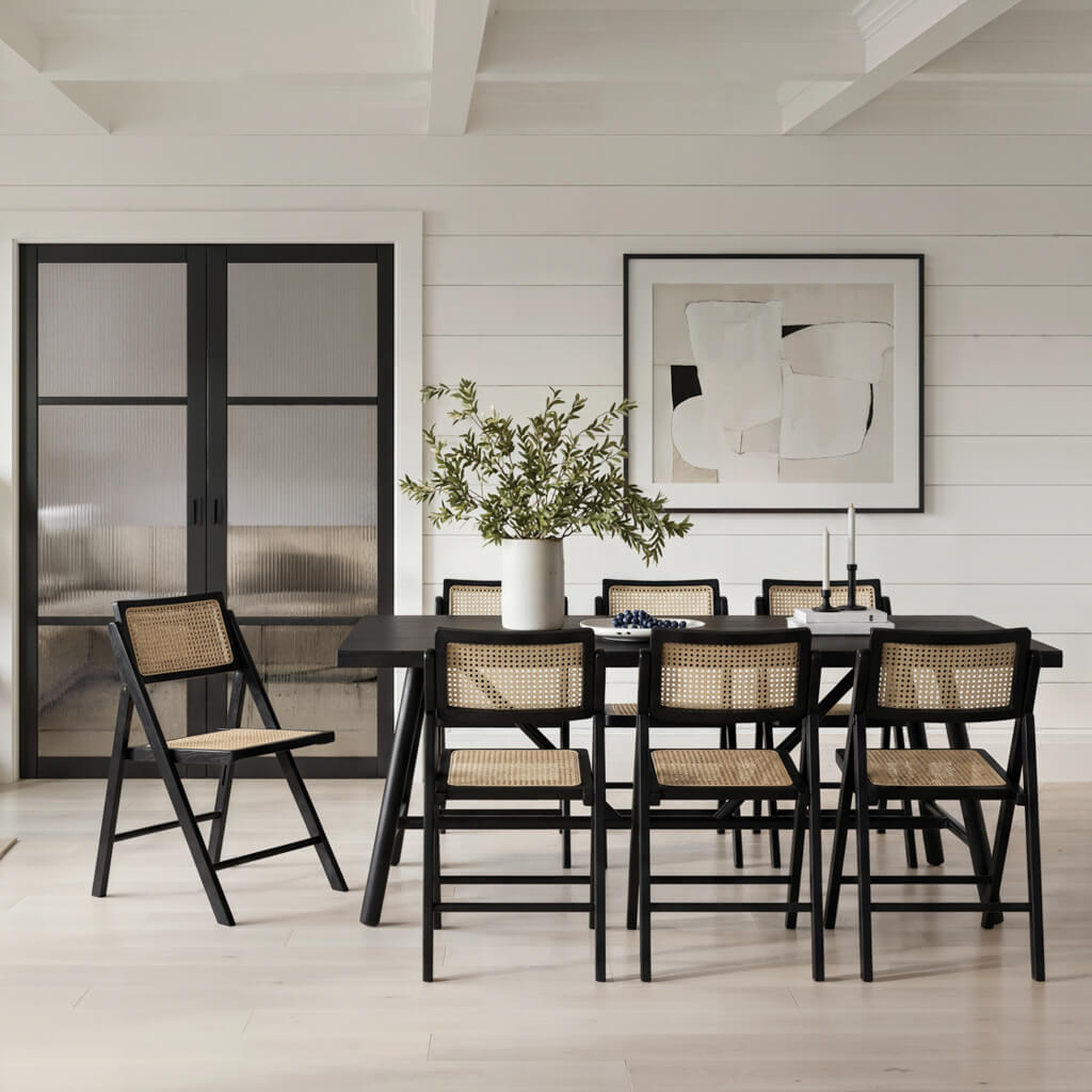 LPD Furniture Ashton black matte dining chair with rattan detailing and ash wood frame in a modern dining setting