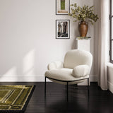 LPD Furniture Avery ivory sherpa fabric chair with matte black metal frame in a modern living room setting