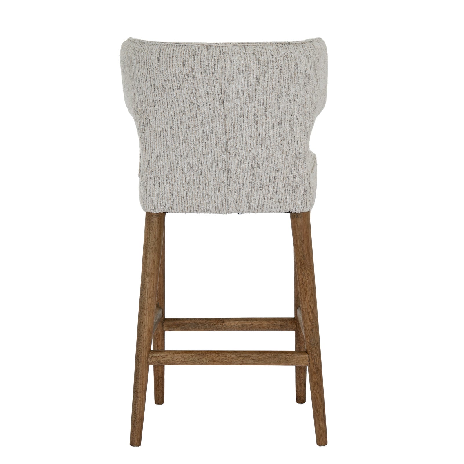 	Hill Interiors Avia mist grey barstool styled with modern barware on a kitchen island