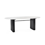 Bolivia oval marble-effect dining table with white glass top and fluted black pedestal legs in a modern dining room setting