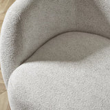 Bowline oyster chenille swivel accent chair in a modern living room setting