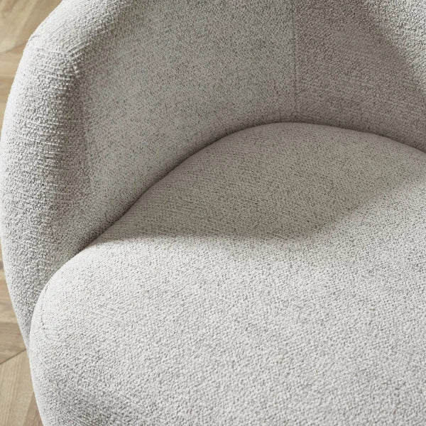 Bowline oyster chenille swivel accent chair in a modern living room setting