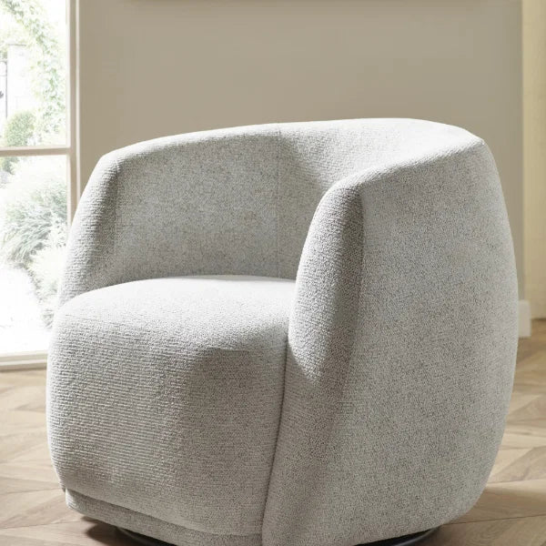 Bowline oyster chenille swivel accent chair in a modern living room setting