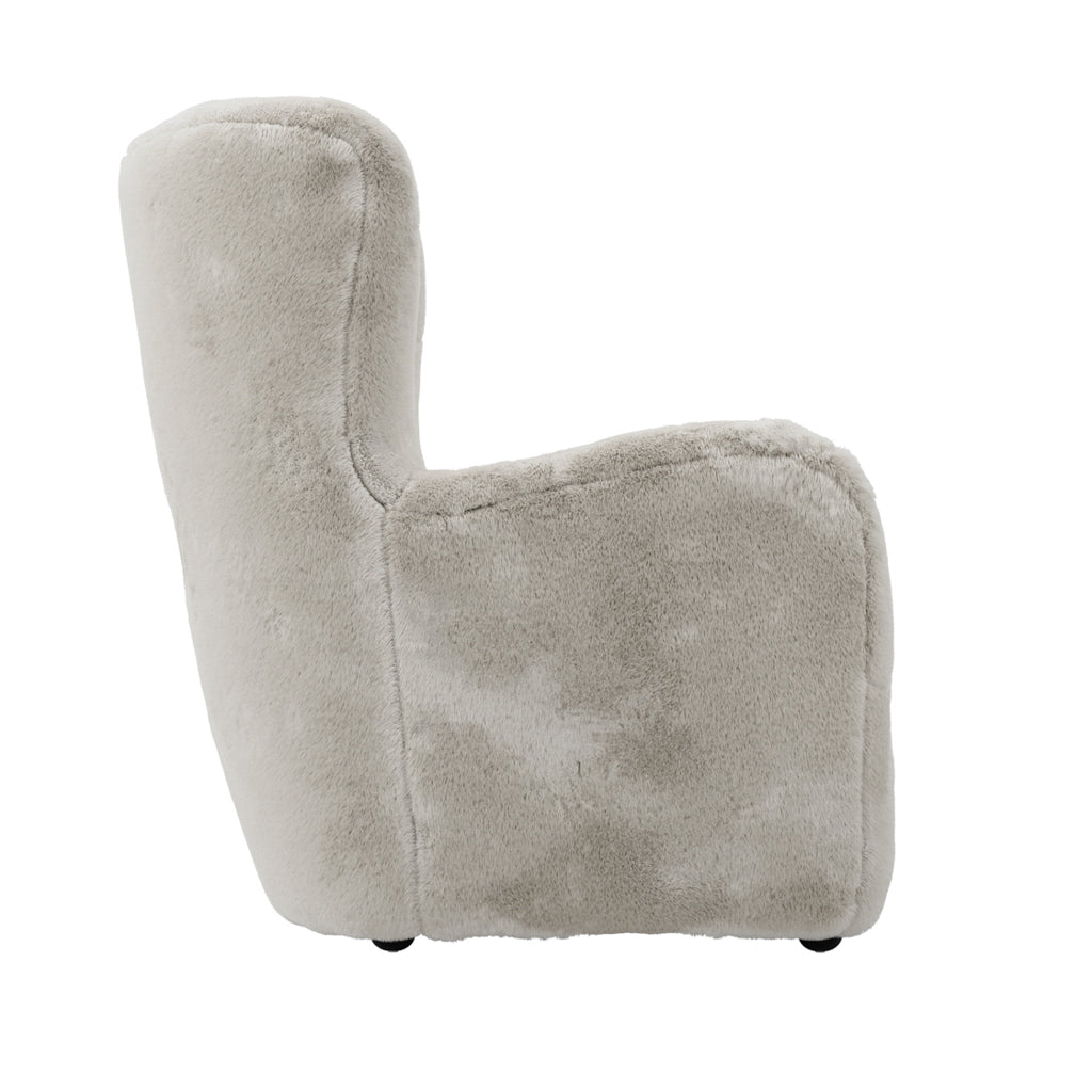 LPD Furniture Bear wolf faux fur armchair in a modern living room setting