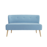 LPD Furniture Beau Cornflower Blue 2 seater sofa with tufted back and blonde wood legs in a modern living room setting