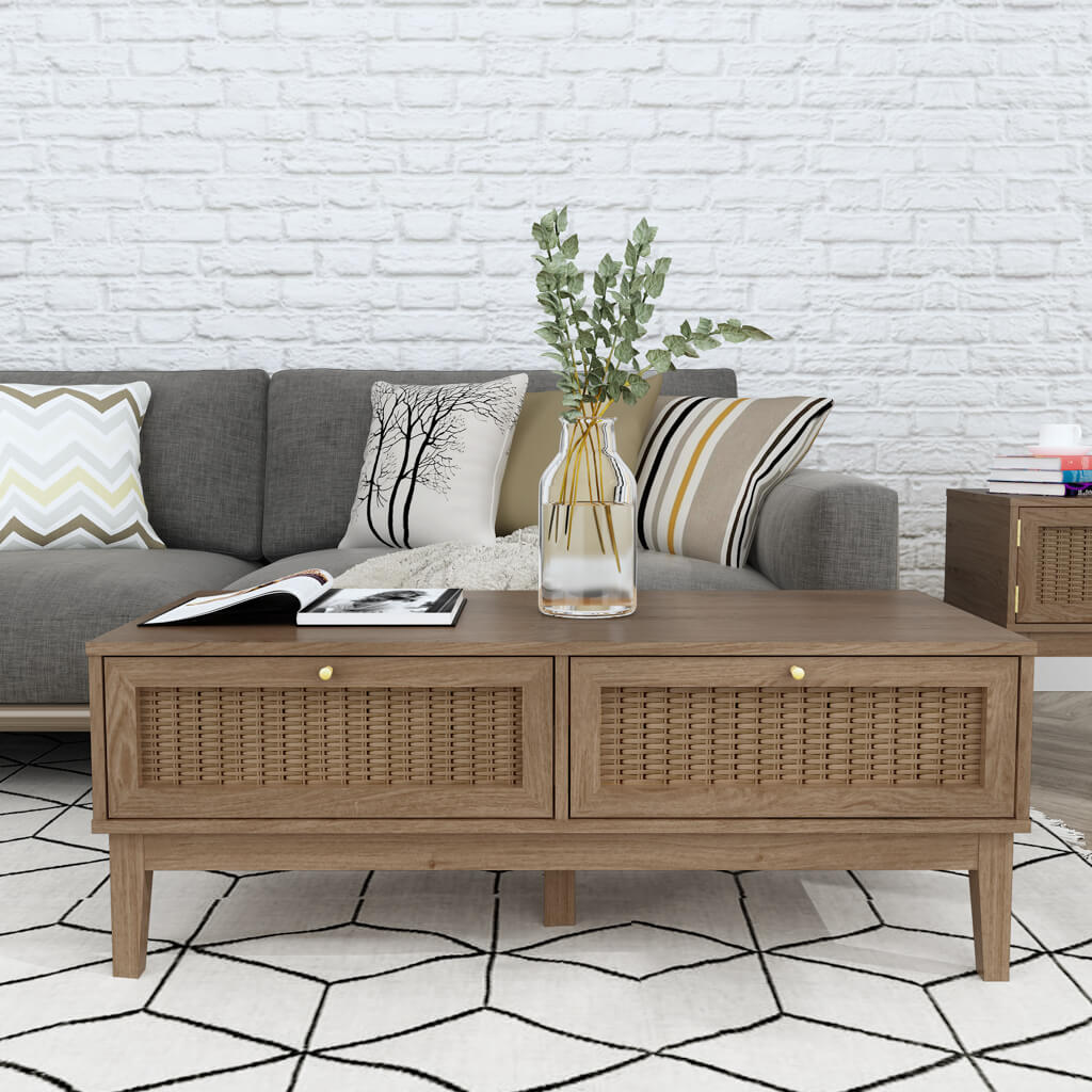 LPD Furniture Bordeaux oak coffee table with rattan front and gold fittings in a modern living room setting
