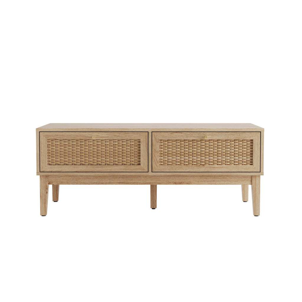 LPD Furniture Bordeaux oak coffee table with rattan front and gold fittings in a modern living room setting