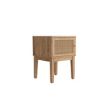 LPD Furniture Bordeaux oak side table with rattan front and gold fittings in a modern bedroom setting