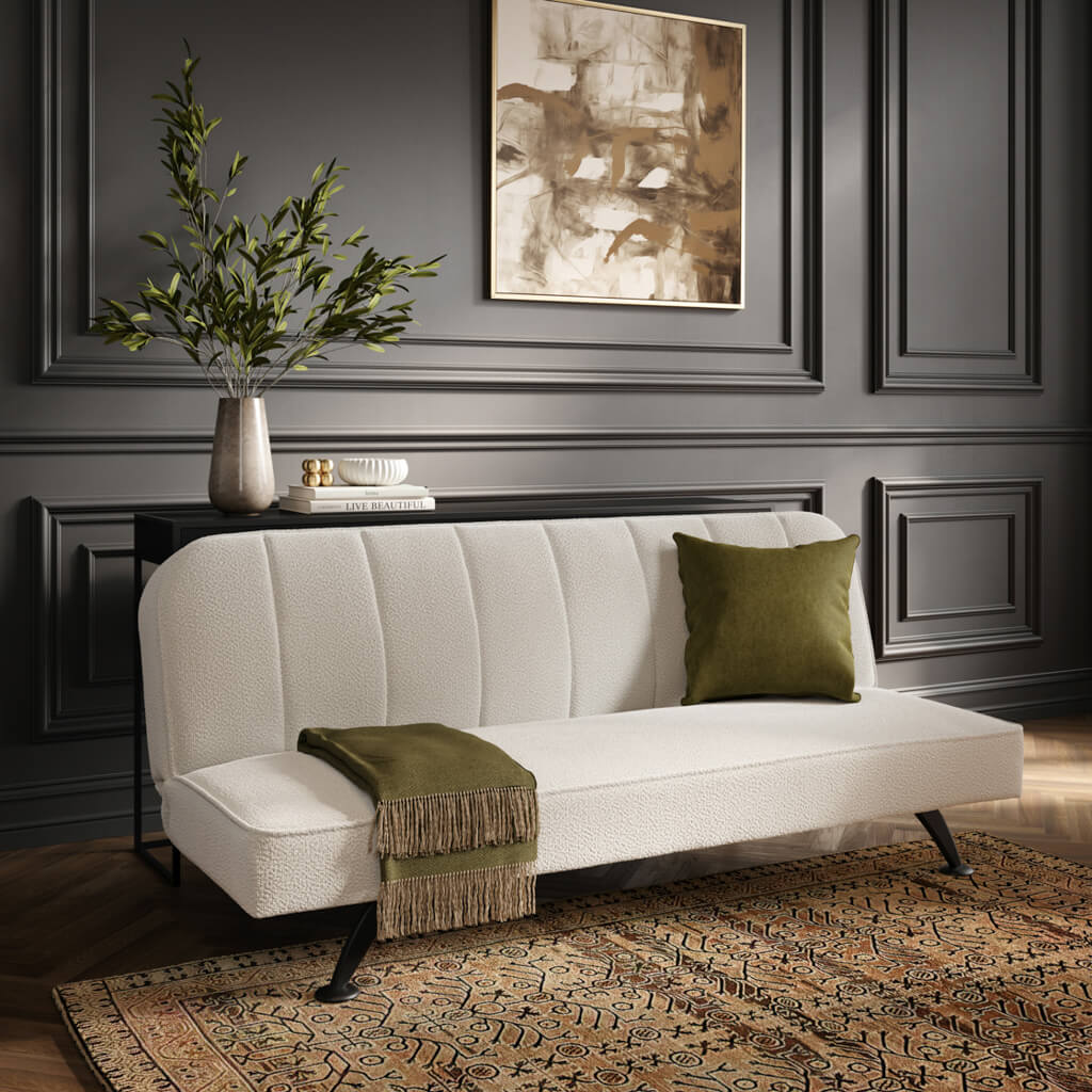 LPD Furniture Burlington ivory boucle sofa bed with matte black legs in a modern living room setting