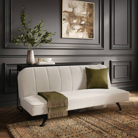 LPD Furniture Burlington ivory boucle sofa bed with matte black legs in a modern living room setting