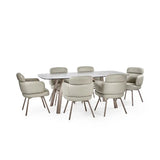 Callisto smoked bubble glass dining table with brushed bronze legs in a modern dining room setting