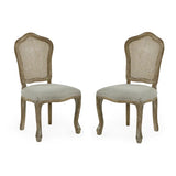Camille set of 2 rattan dining chairs with handwoven backrest and beige linen seats in a modern dining room