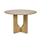 Cellini round oak-effect dining table with sculptural intersecting base in a modern dining room setting