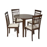 Julian Bowen Coast walnut drop leaf dining table in a modern compact dining setting