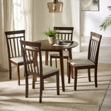 Julian Bowen Coast walnut drop leaf dining table in a modern compact dining setting