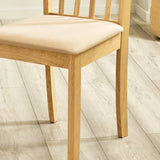 Julian Bowen Coast set of 2 natural oak slat back dining chairs with upholstered seats in a modern dining setting