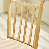 Julian Bowen Coast set of 2 natural oak slat back dining chairs with upholstered seats in a modern dining setting