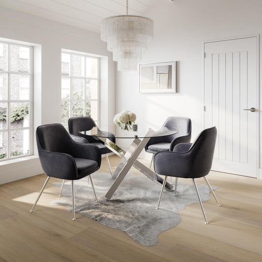 LPD Furniture Capri clear glass dining table with polished silver legs in a modern dining setting