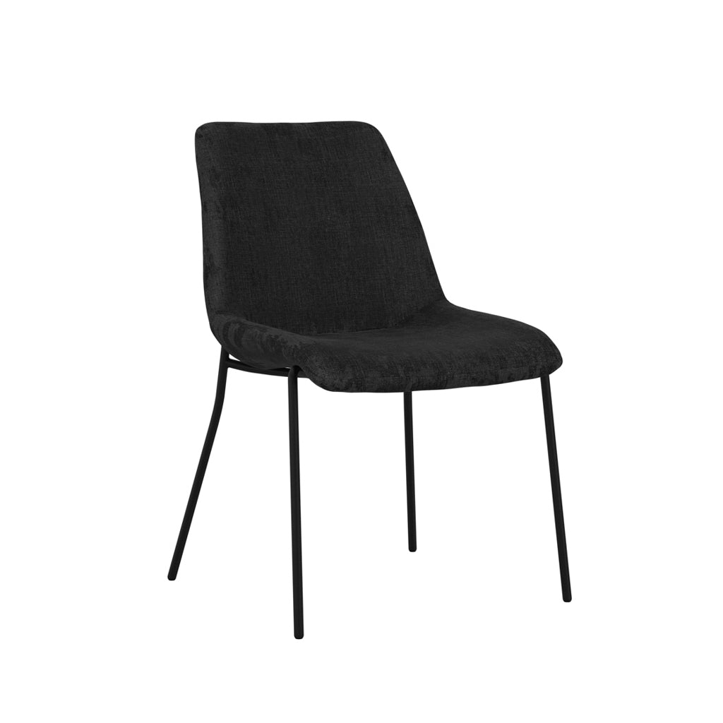 LPD Furniture Carlo black textured velvet dining chair with curved metal back in a modern dining setting