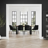 LPD Furniture Carlo black textured velvet dining chair with curved metal back in a modern dining setting