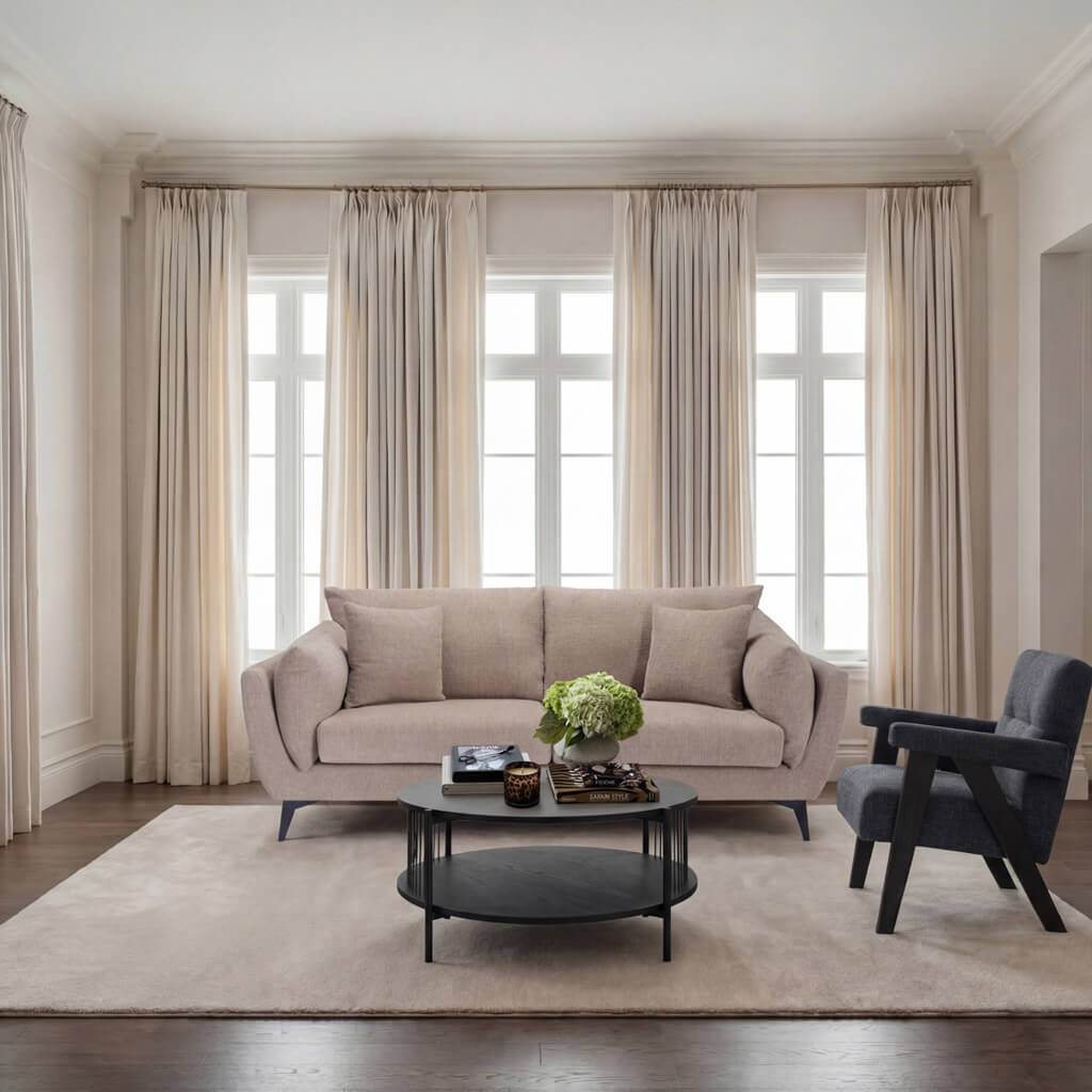 LPD Furniture Carter taupe 3 seater sofa with pillow-shaped design, matte black legs, and scatter cushions in a modern living room setting