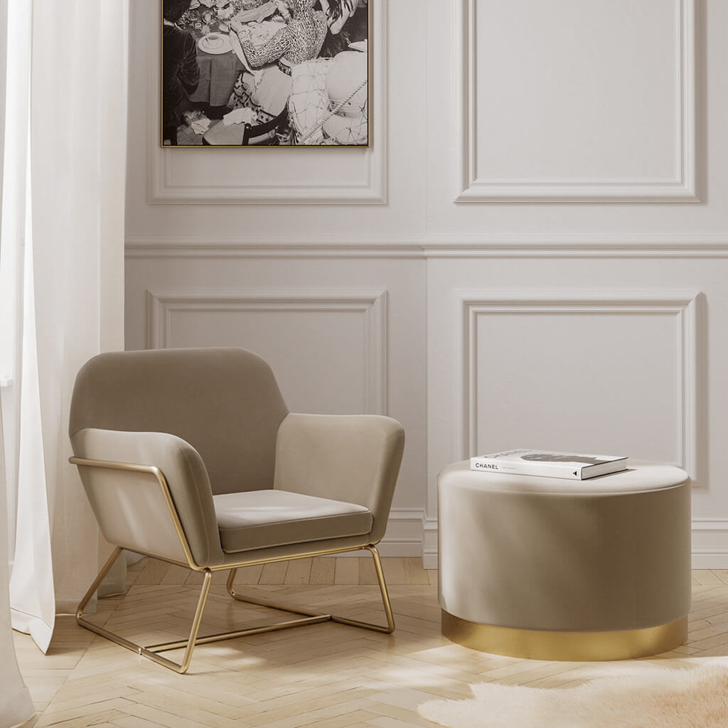 LPD Furniture Charles beige velvet armchair with brushed gold frame in a modern living room setting