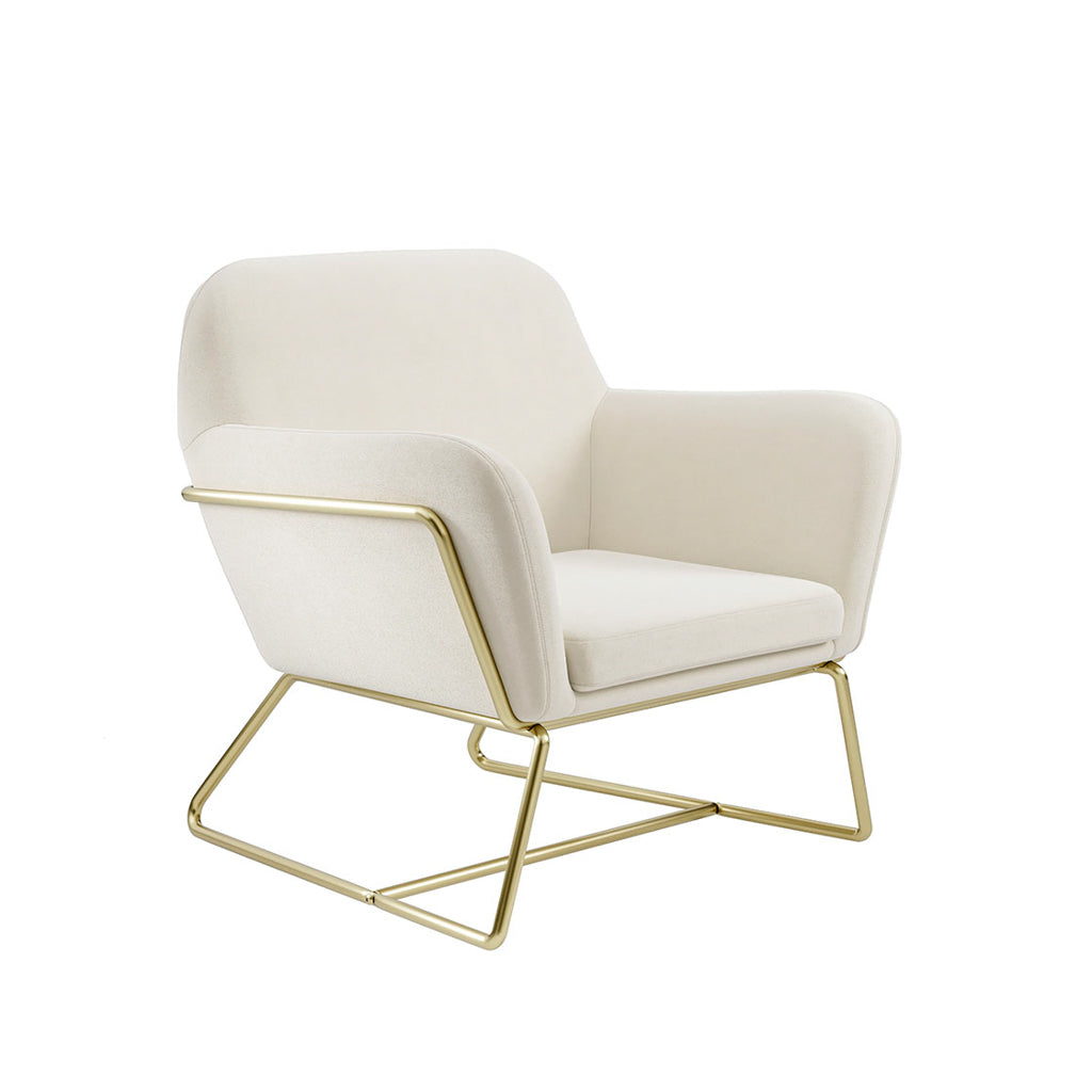 LPD Furniture Charles beige velvet armchair with brushed gold frame in a modern living room setting