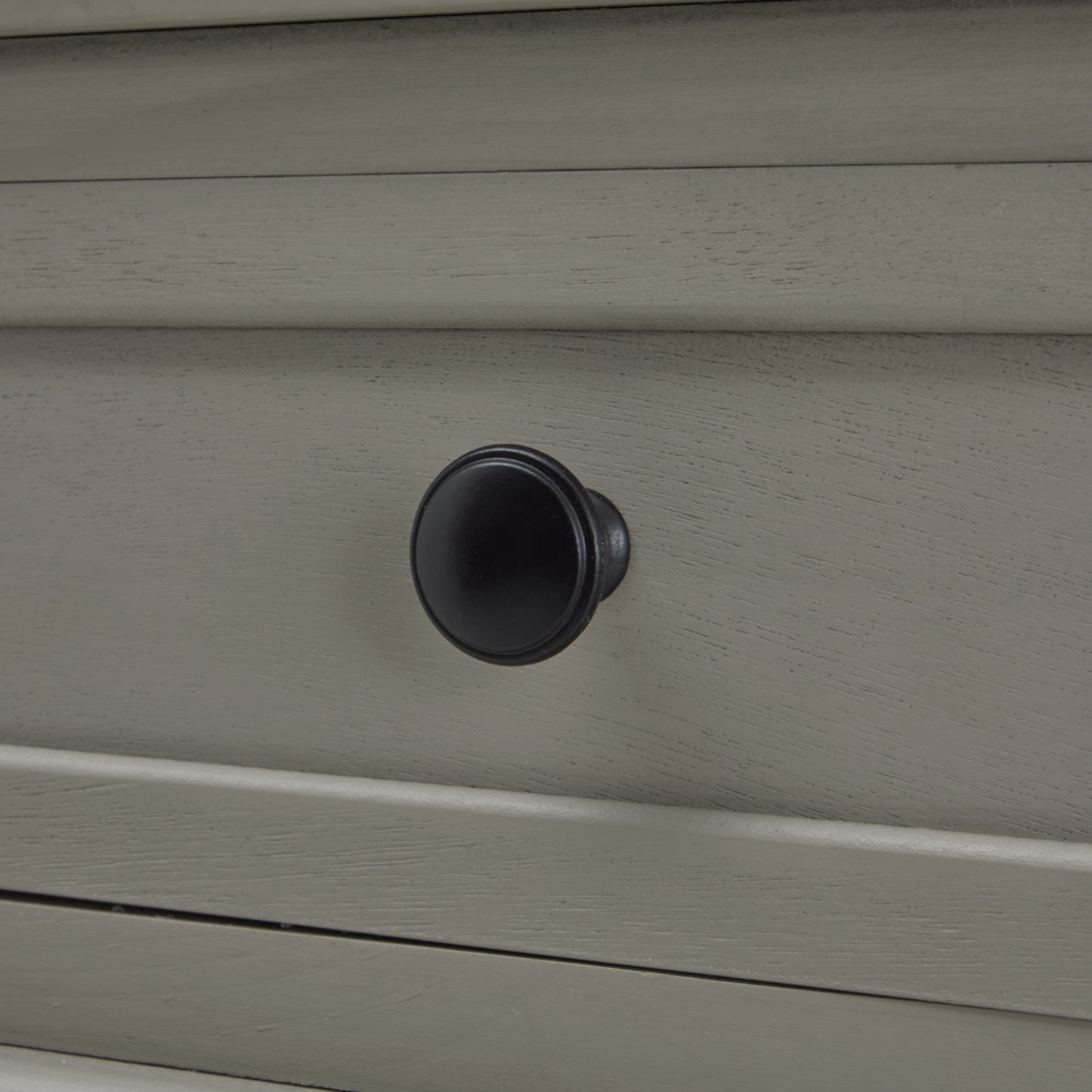 Close-up of Hill Interiors Camden Collection console table showcasing the wood grain and drawer handles