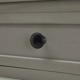 Close-up of Hill Interiors Camden Collection console table showcasing the wood grain and drawer handles