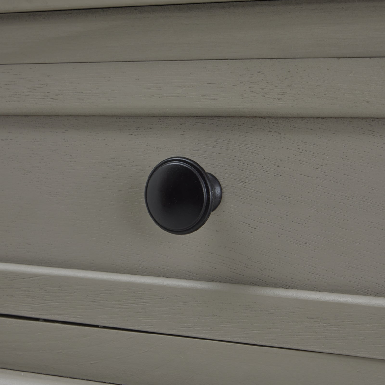 Close-up of Hill Interiors Camden Collection console table showcasing the wood grain and drawer handles