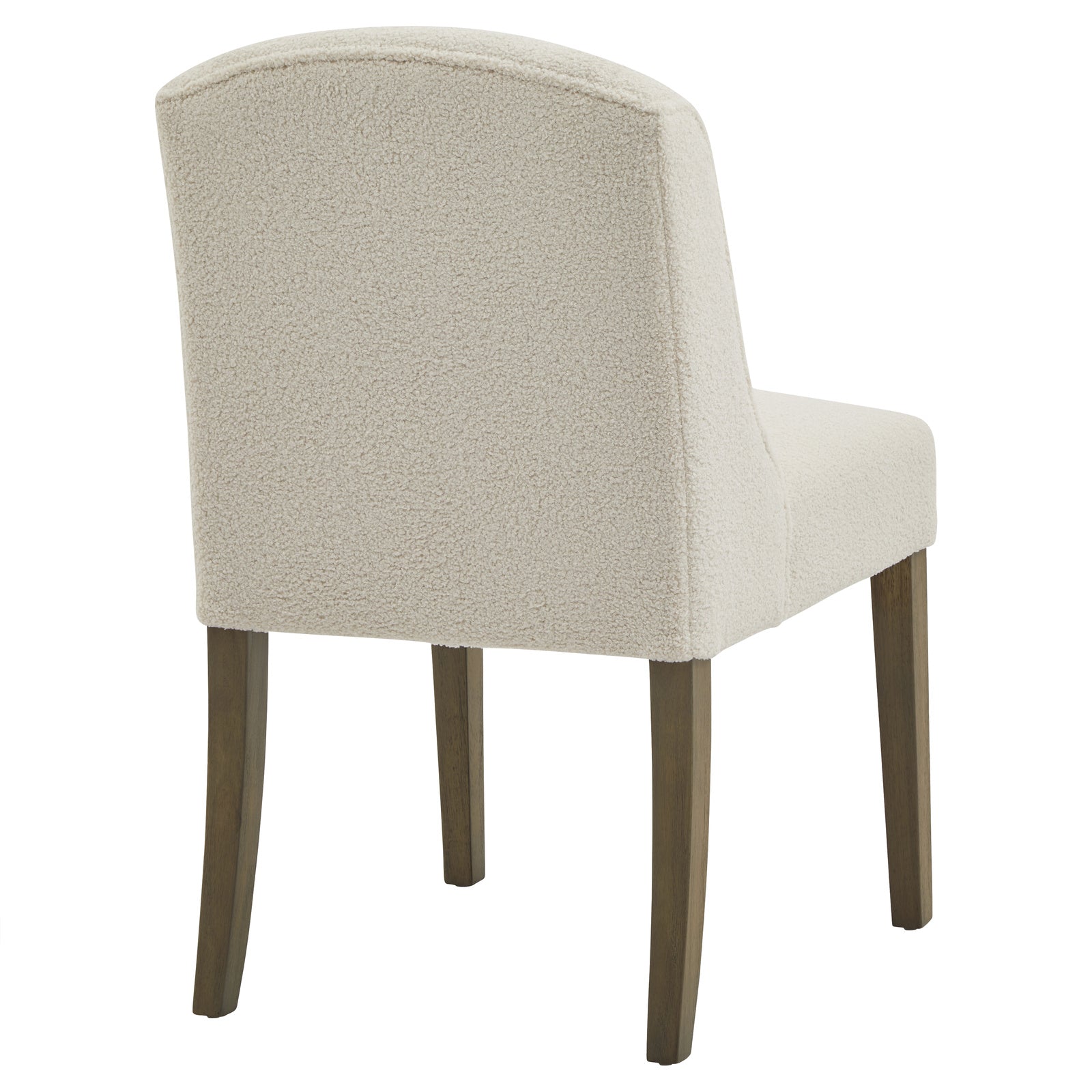 Close-up of Hill Interiors Compton boucle dining chair showcasing the luxurious cream fabric texture and stitching
