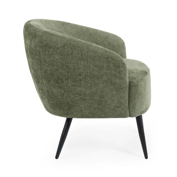 Dahlia olive green accent chair with curved backrest in a modern living room setting