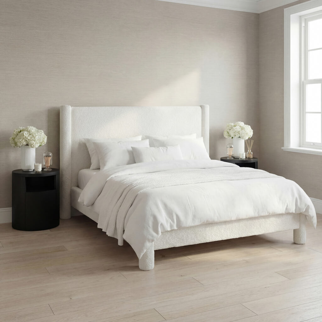 LPD Furniture Dena snow white upholstered bed in a modern bedroom setting
